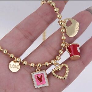 Gold and Red Charm necklace